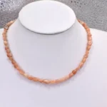 Güneş Taşı Amorf Kolye – Enerji ve Işıltının Simgesi